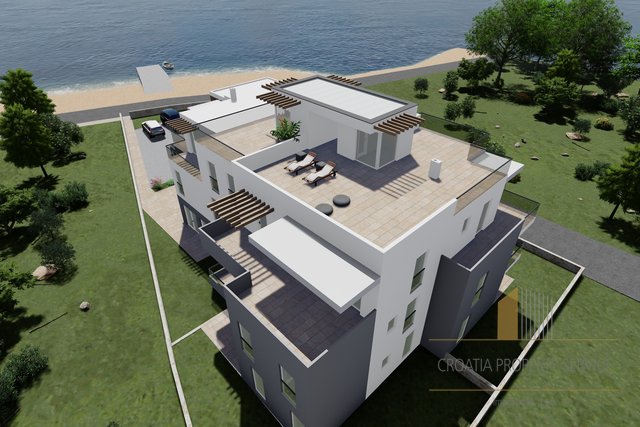 Роскошная квартира с террасой на крыше в новом доме в первом ряду от моря - Срима!