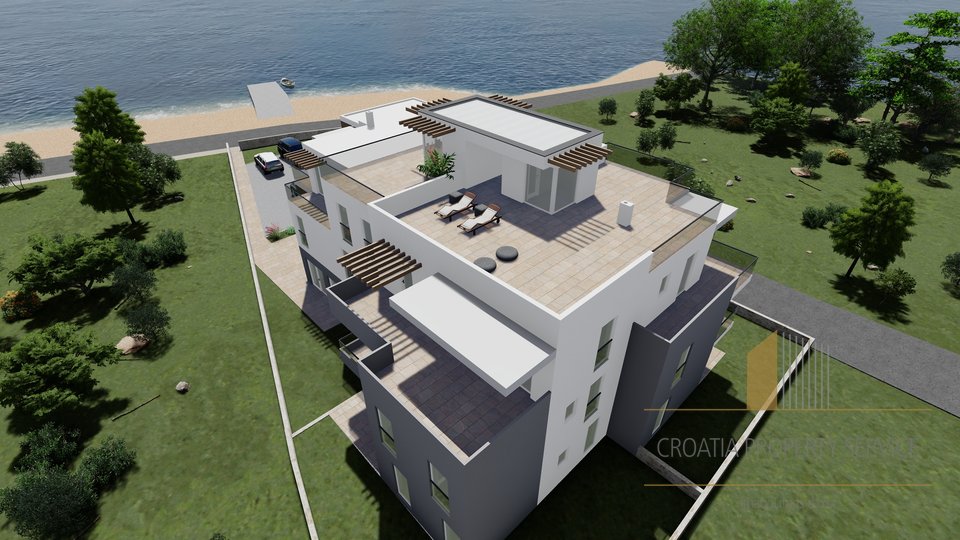 Роскошная квартира с террасой на крыше в новом доме в первом ряду от моря - Срима!