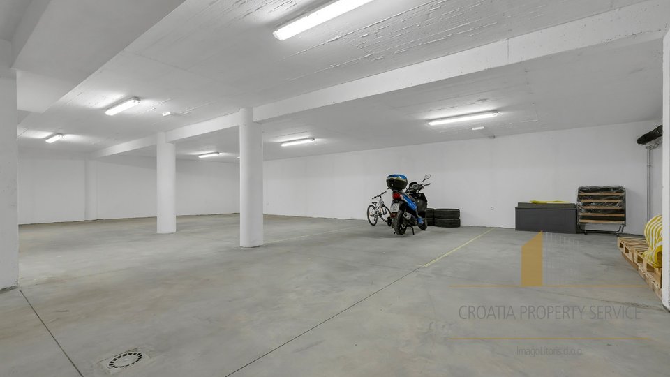 APARTMENT IN A NEWLY BUILT BUILDING IN MAKARSKA, WITH A VIEW AND A GARAGE PARKING SPACE