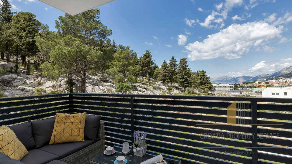 APARTMENT IN A NEWLY BUILT BUILDING IN MAKARSKA, WITH A VIEW AND A GARAGE PARKING SPACE
