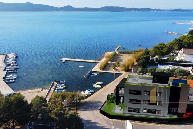 Luxury apartment in a new building, first row by the sea in Sukošan!