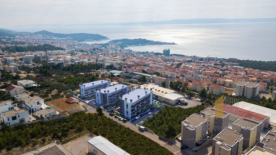 One-room apartment with a garden in a luxurious new building with an open sea view - Makarska!