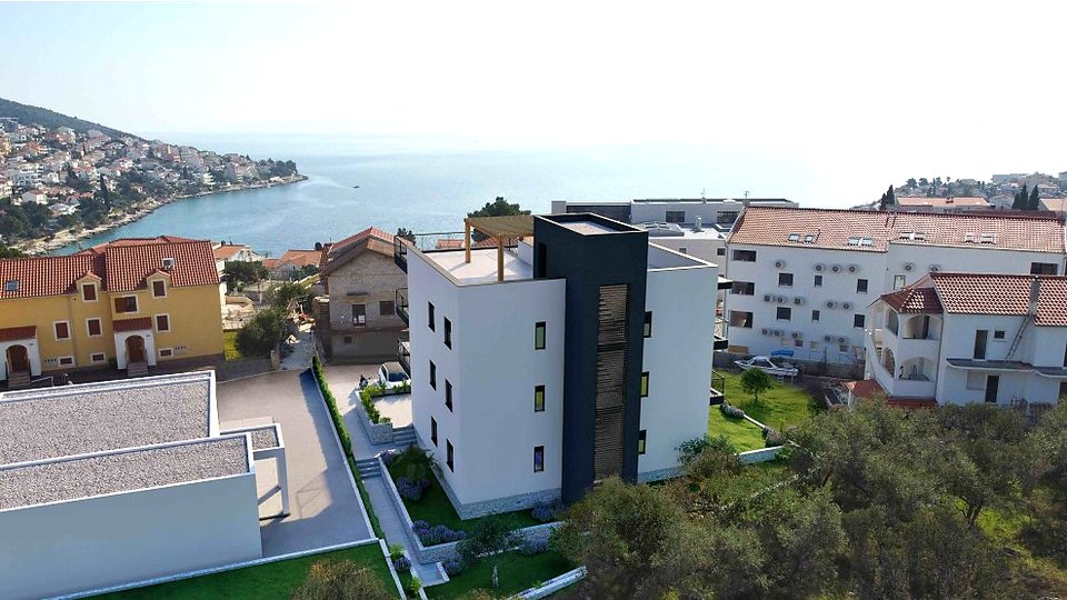 Apartment with a garden in a modern new building 200 m from the beach on the island of Čiovo!
