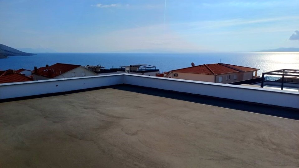 Luxurious apartment with a garden in a modern new building 200 m from the sea on the island of Čiovo!