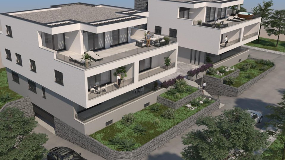 Eine geräumige Wohnung mit Garten in einem luxuriösen Neubau - Kaštela!