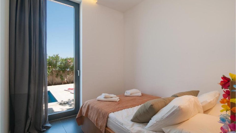 Two luxury villas with a swimming pool in the first row by the beach on the island of Brač!